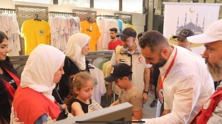 ERC Donates Clothes Aid To Syria