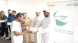 Dubai Police Give Iftar Meals To Workers