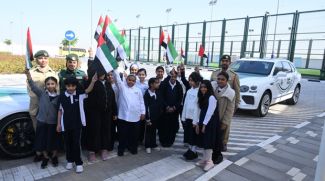 Dubai Police Welcome Students With UAE Flag