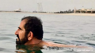 Sheikh Mohammed beats the heat by taking a dip
